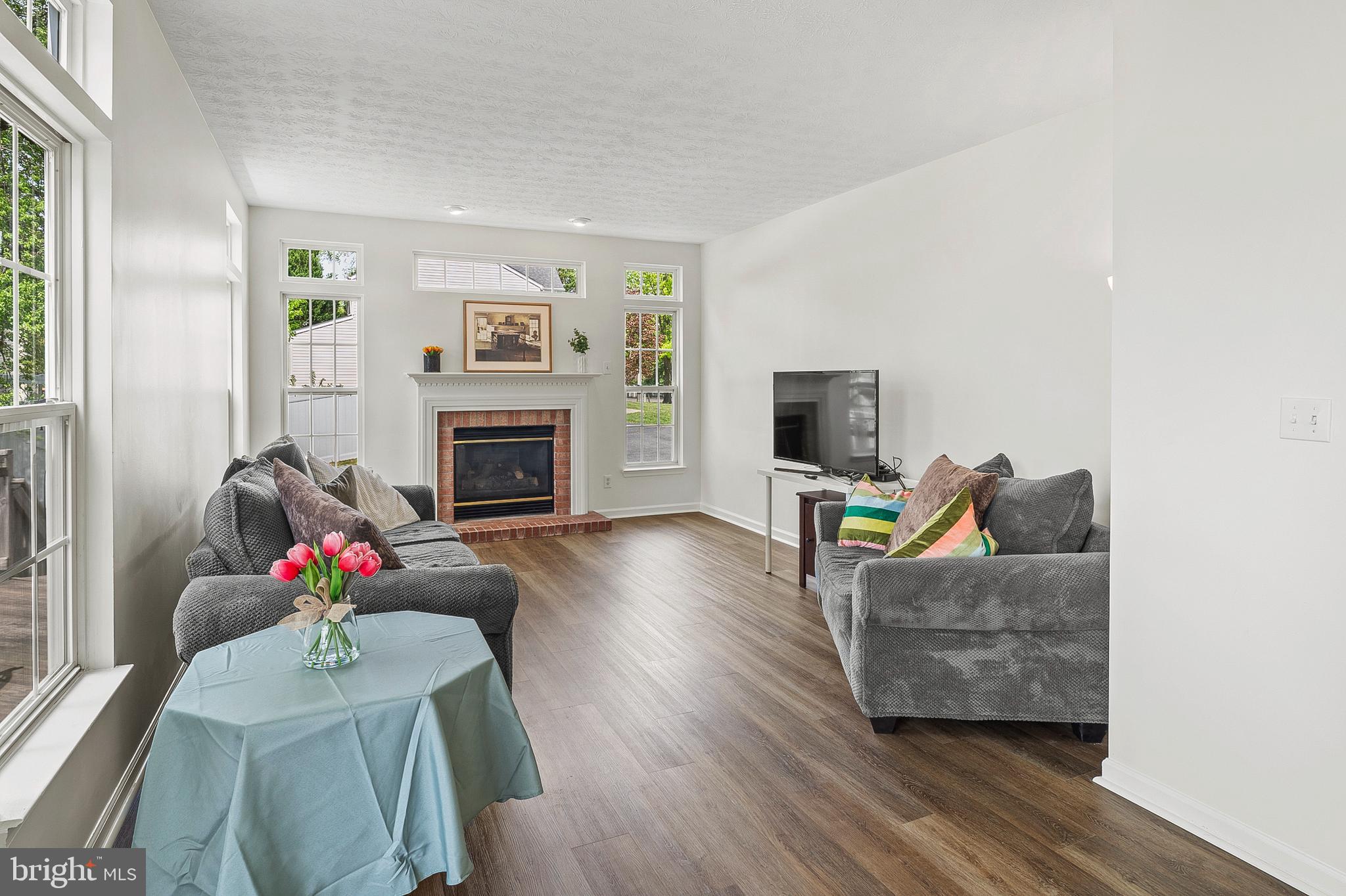 456 North Patuxent Road Odenton, MD 21113 - Photo 14 of 44 a living room with furniture flat screen tv and a fireplace