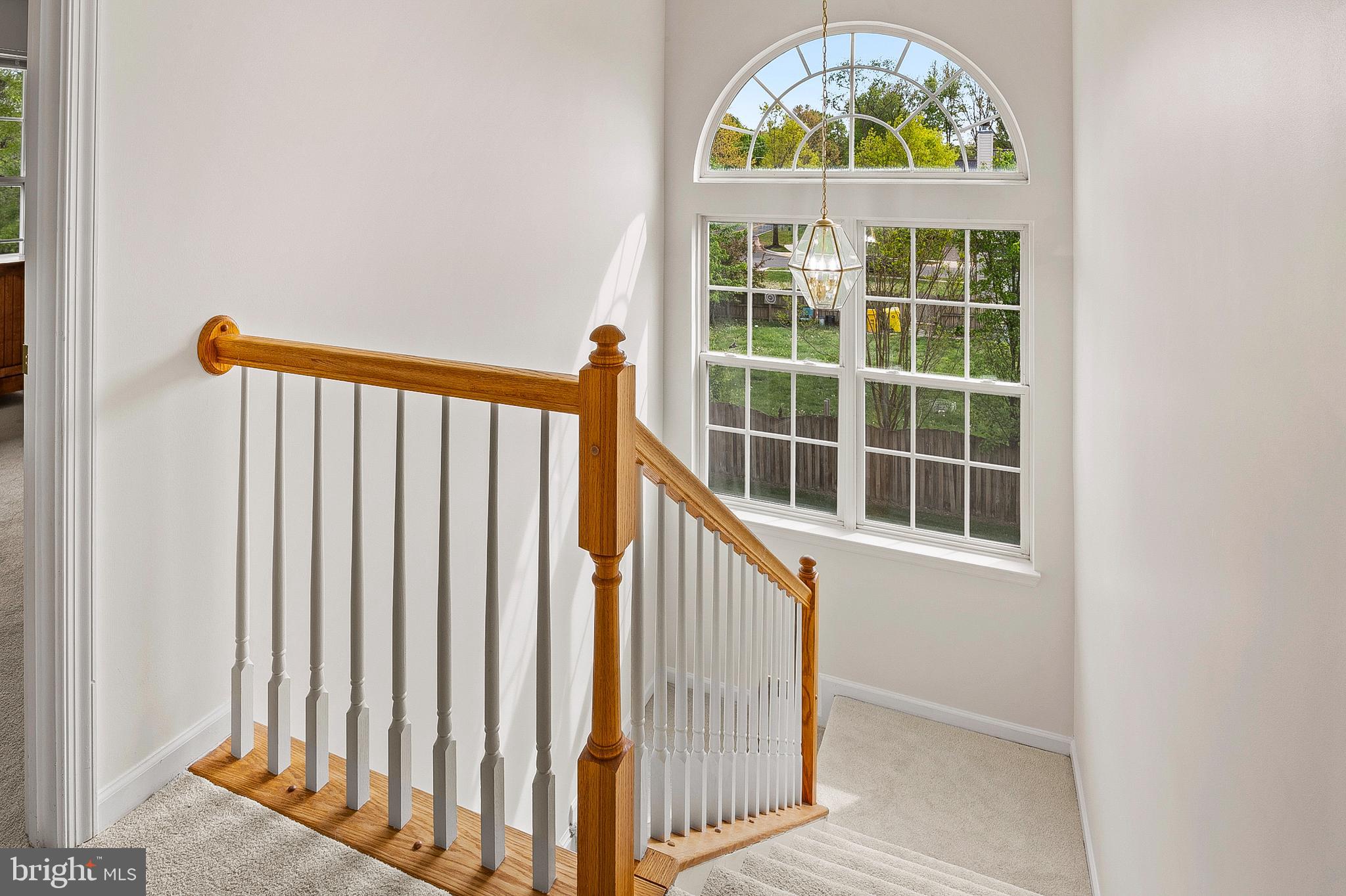 456 North Patuxent Road Odenton, MD 21113 - Photo 17 of 44 an entryway with wooden floor & a window