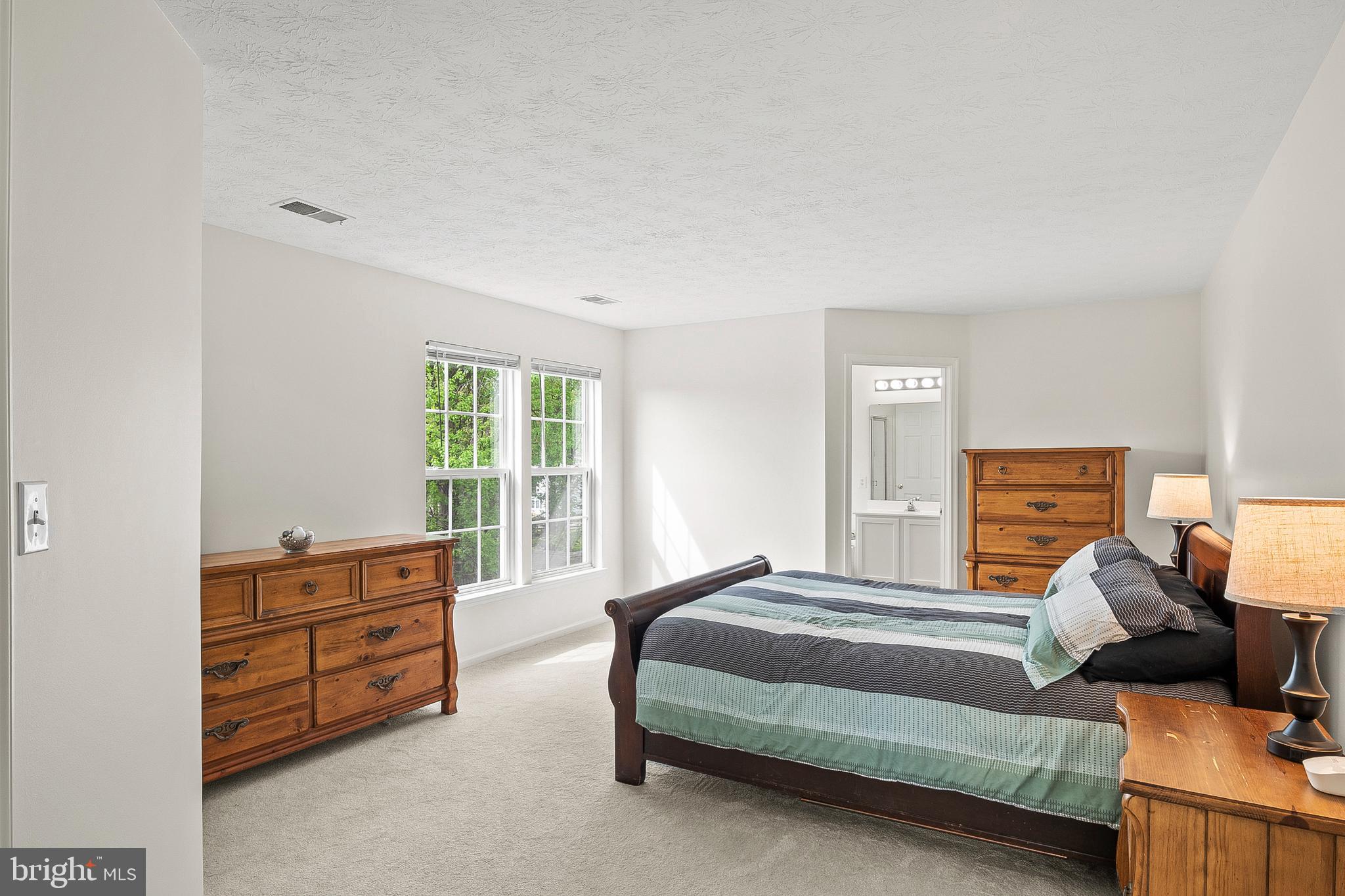 456 North Patuxent Road Odenton, MD 21113 - Photo 20 of 44 a bedroom with a bed and dresser