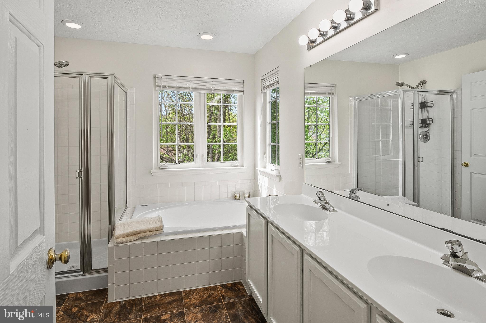 456 North Patuxent Road Odenton, MD 21113 - Photo 22 of 44 a bathroom with a tub sink and mirror
