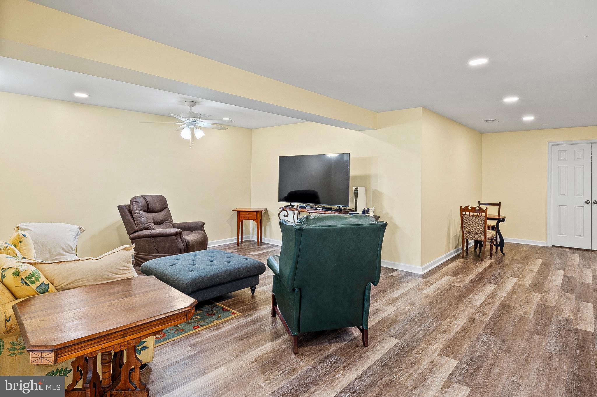 456 North Patuxent Road Odenton, MD 21113 - Photo 29 of 44 a living room with furniture and a flat screen tv