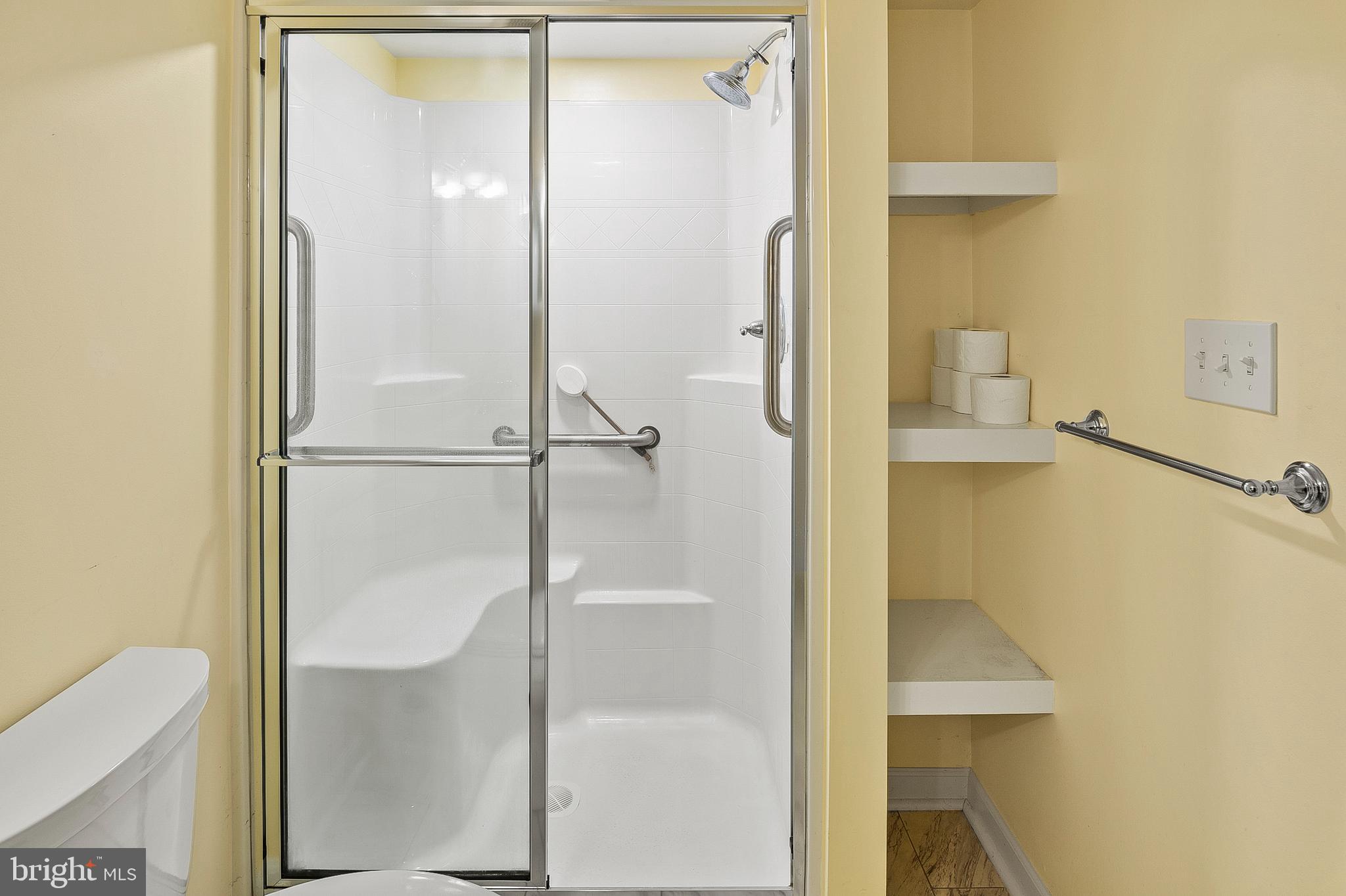 456 North Patuxent Road Odenton, MD 21113 - Photo 33 of 44 a bathroom with a glass shower door