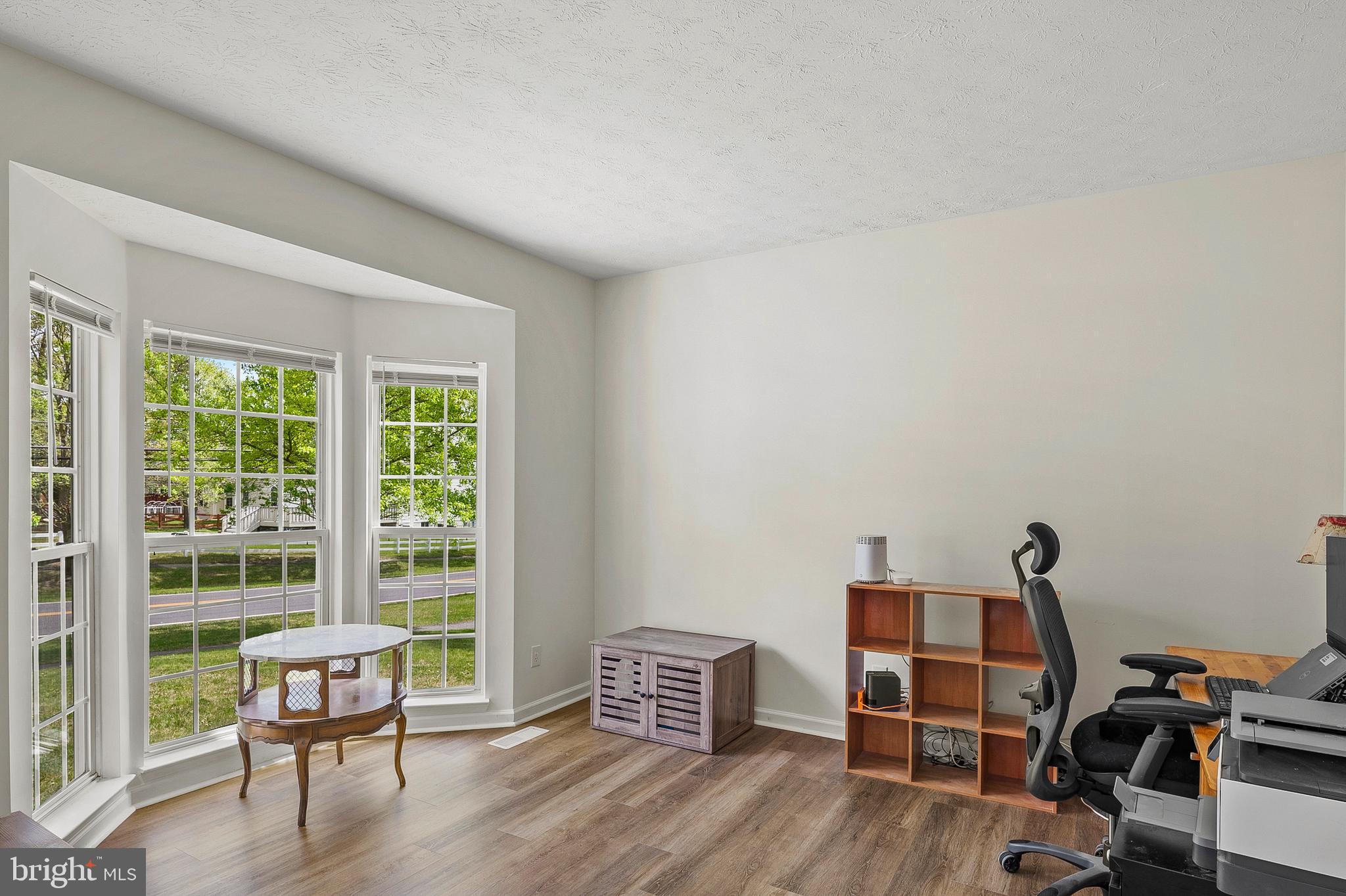 456 North Patuxent Road Odenton, MD 21113 - Photo 6 of 44 a view of a workspace with furniture and a window