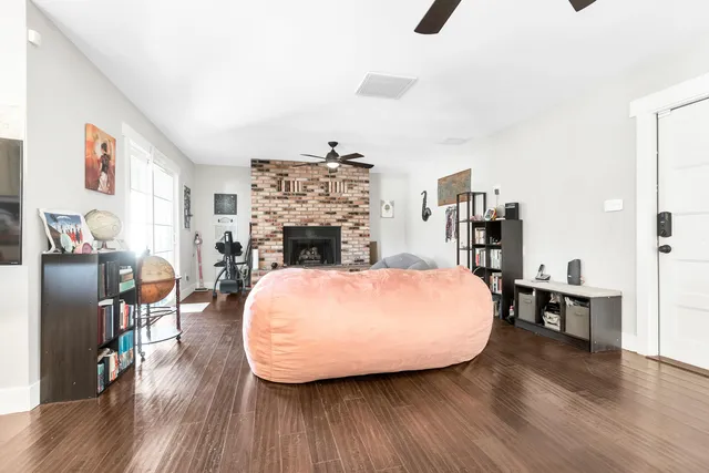 a bed room with furniture and a fireplace