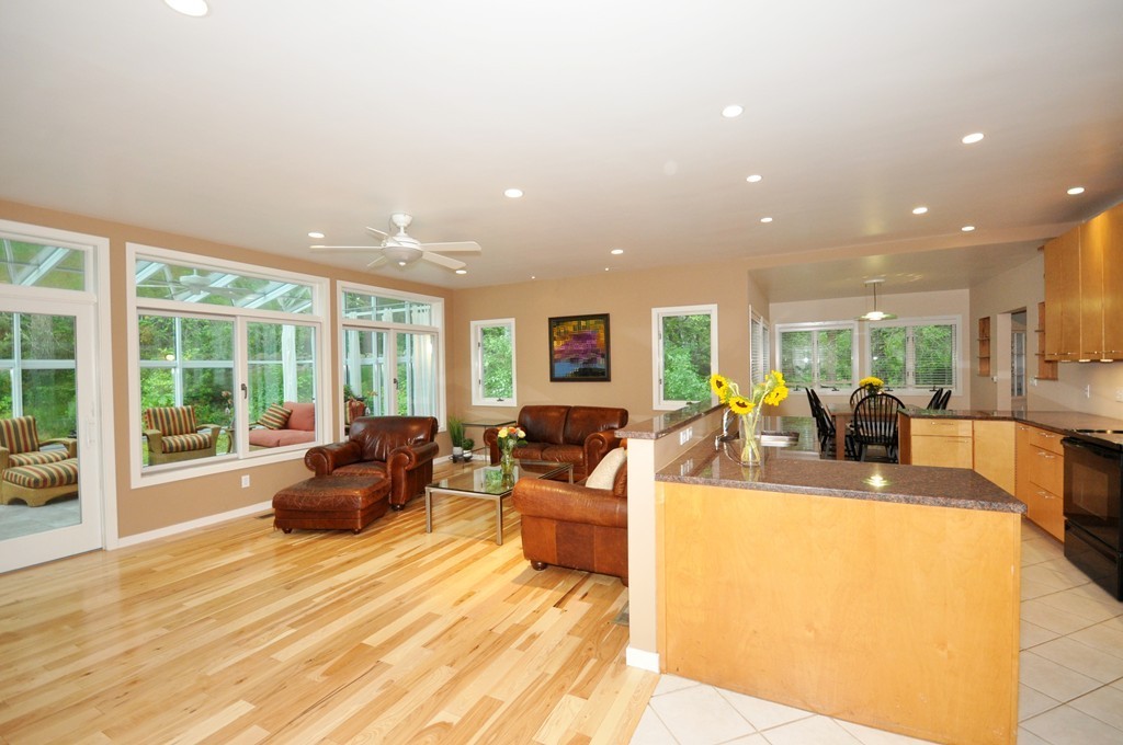 138 Tower Road Lincoln, MA 01773 - Photo 1 of 23 a living room with fireplace furniture and a large window