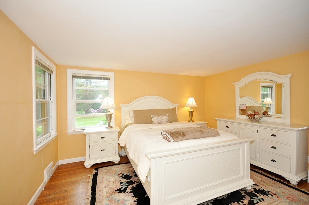 138 Tower Road Lincoln, MA 01773 - Photo 11 of 23 a bed room with a bed and a window