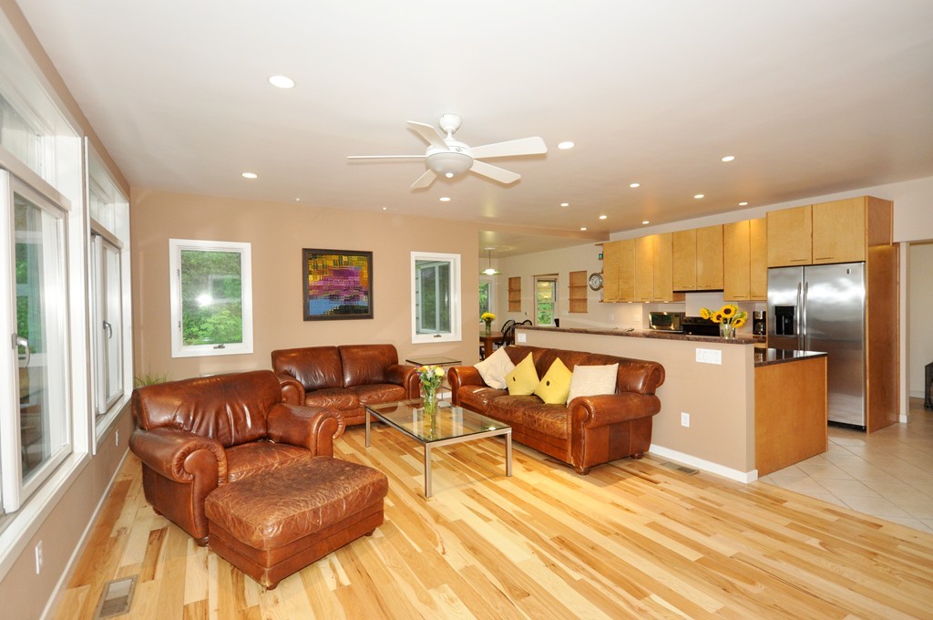 138 Tower Road Lincoln, MA 01773 - Photo 5 of 23 a living room with fireplace furniture and a wooden floor