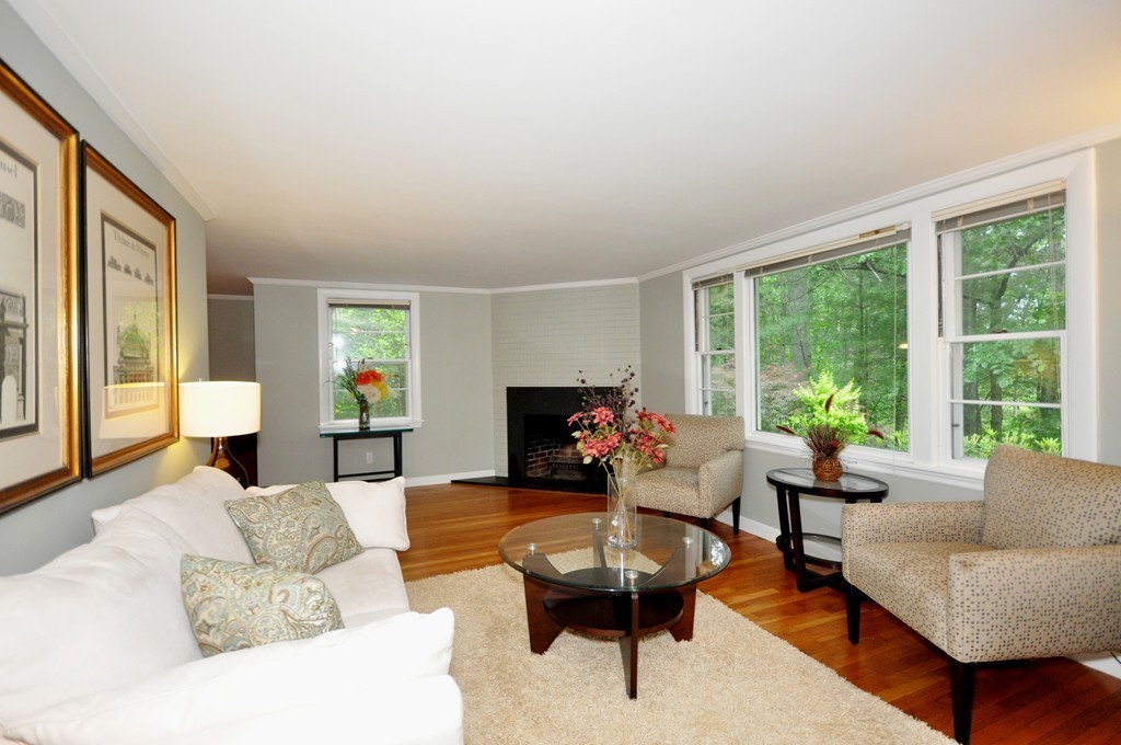 138 Tower Road Lincoln, MA 01773 - Photo 10 of 23 a living room with furniture and a large window