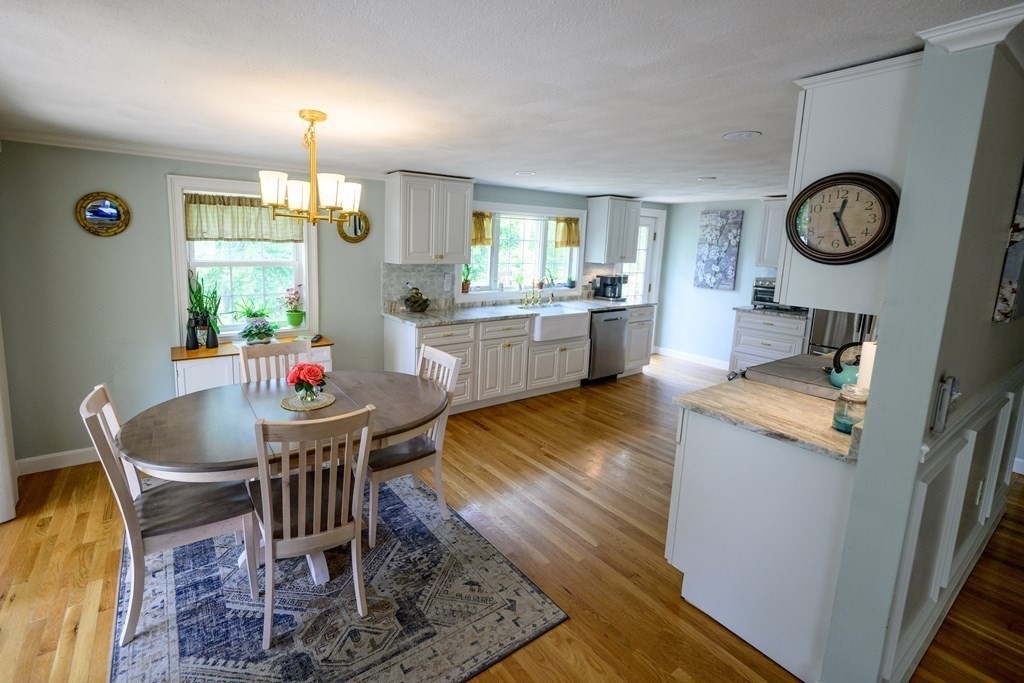 462 Goldthwaite Road Northbridge, MA 01588 - Photo 16 of 40 a dining room with furniture a window and a rug