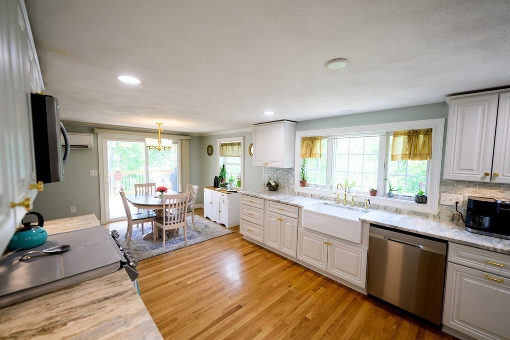 462 Goldthwaite Road Northbridge, MA 01588 - Photo 18 of 40 a large kitchen with granite countertop lots of counter top space and stainless steel appliances