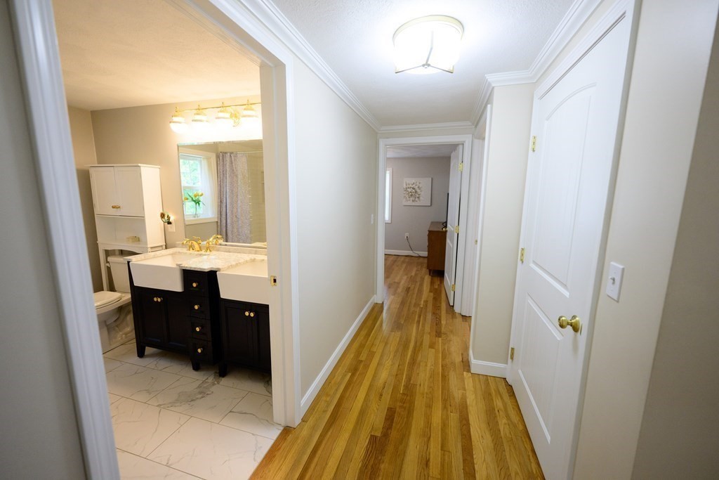 462 Goldthwaite Road Northbridge, MA 01588 - Photo 21 of 40 a en suite bathroom with a sink and mirror