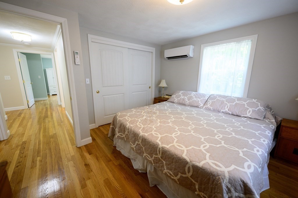 462 Goldthwaite Road Northbridge, MA 01588 - Photo 26 of 40 a bedroom with a bed and wooden floor