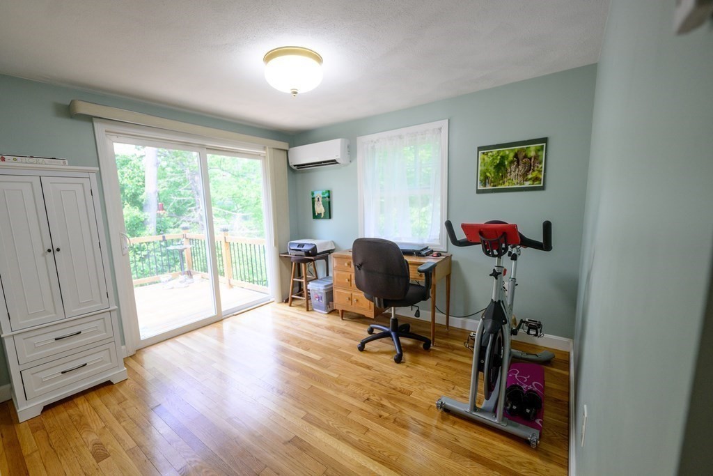 462 Goldthwaite Road Northbridge, MA 01588 - Photo 29 of 40 a view of a workspace with furniture and a window