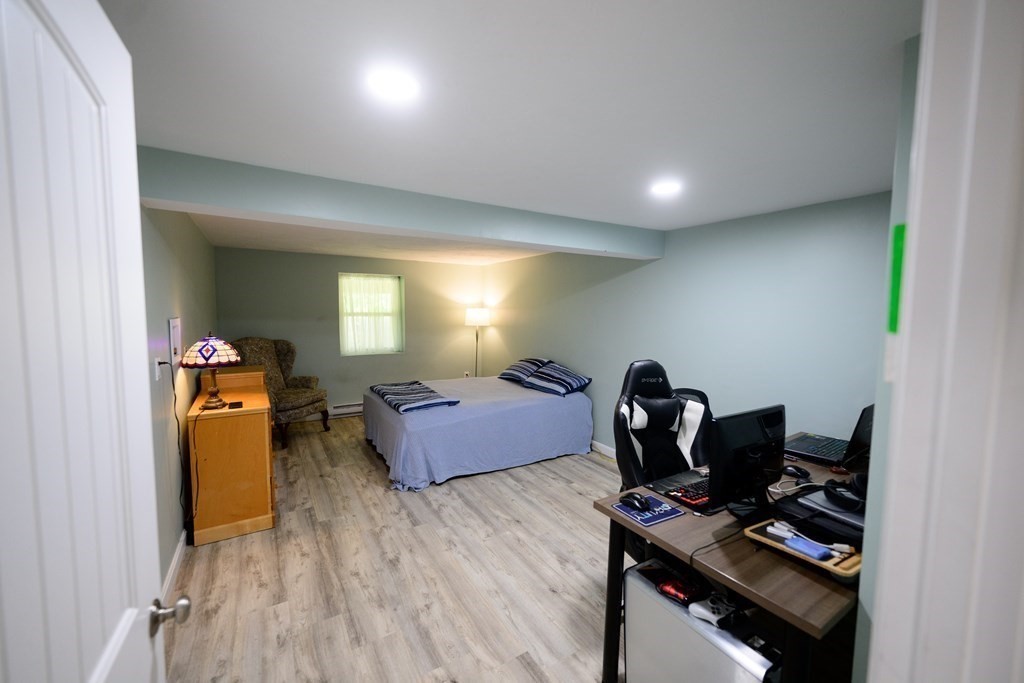 462 Goldthwaite Road Northbridge, MA 01588 - Photo 36 of 40 a workspace with furniture and wooden floor