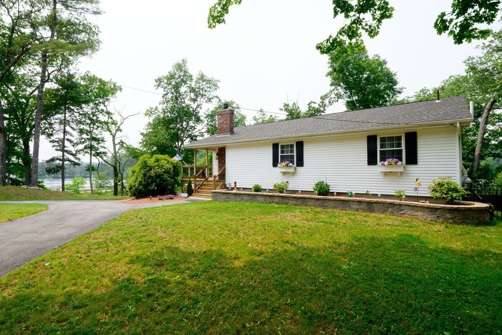 462 Goldthwaite Road Northbridge, MA 01588 - Photo 4 of 40 a front view of house with yard and outdoor seating
