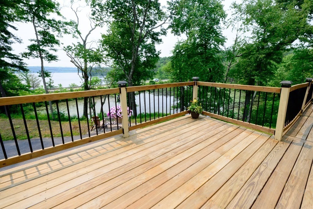 462 Goldthwaite Road Northbridge, MA 01588 - Photo 8 of 40 a view of balcony with wooden floor and fence