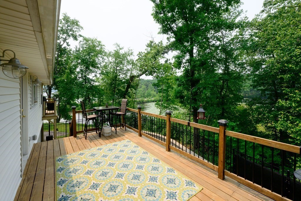 462 Goldthwaite Road Northbridge, MA 01588 - Photo 10 of 40 a view of balcony with wooden floor and seating space