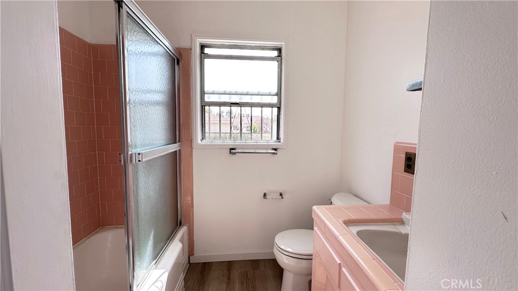 532 West Markland Drive Monterey Park, CA 91754 - Photo 4 of 7 a white toilet sitting next to a bathroom sink