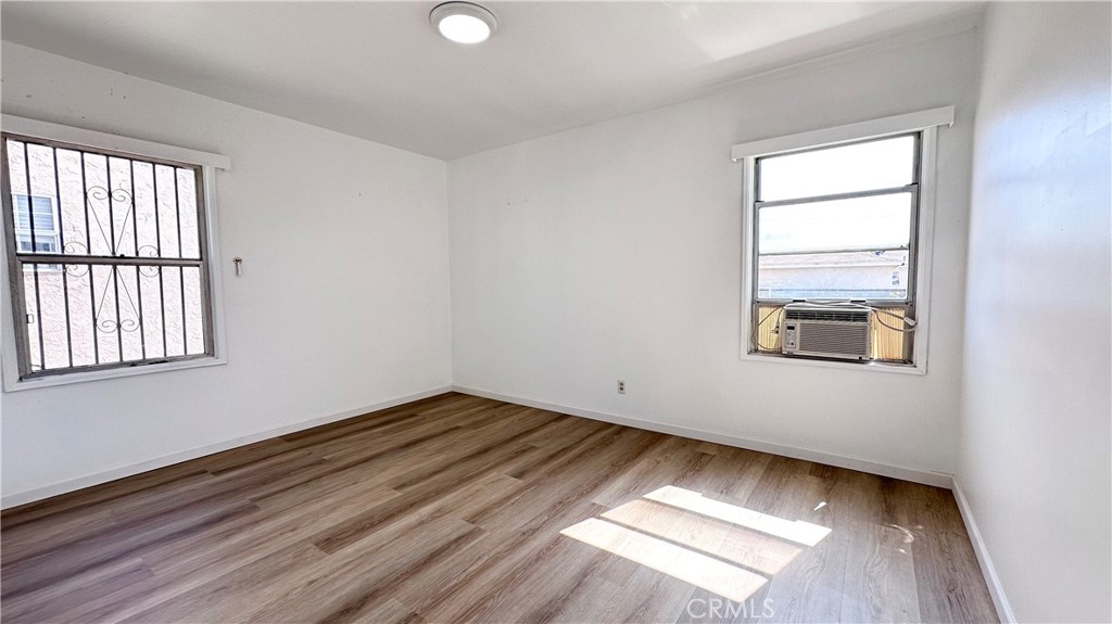 532 West Markland Drive Monterey Park, CA 91754 - Photo 5 of 7 wooden floor in an empty room with a window