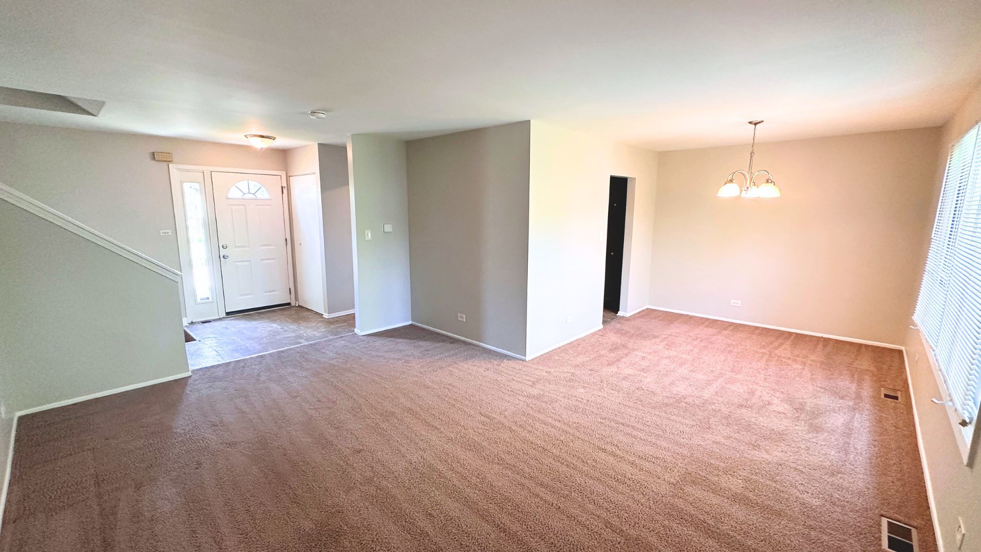 123 Oriole Road Matteson, IL 60443 - Photo 3 of 21 a view of empty room with wooden floor and fan