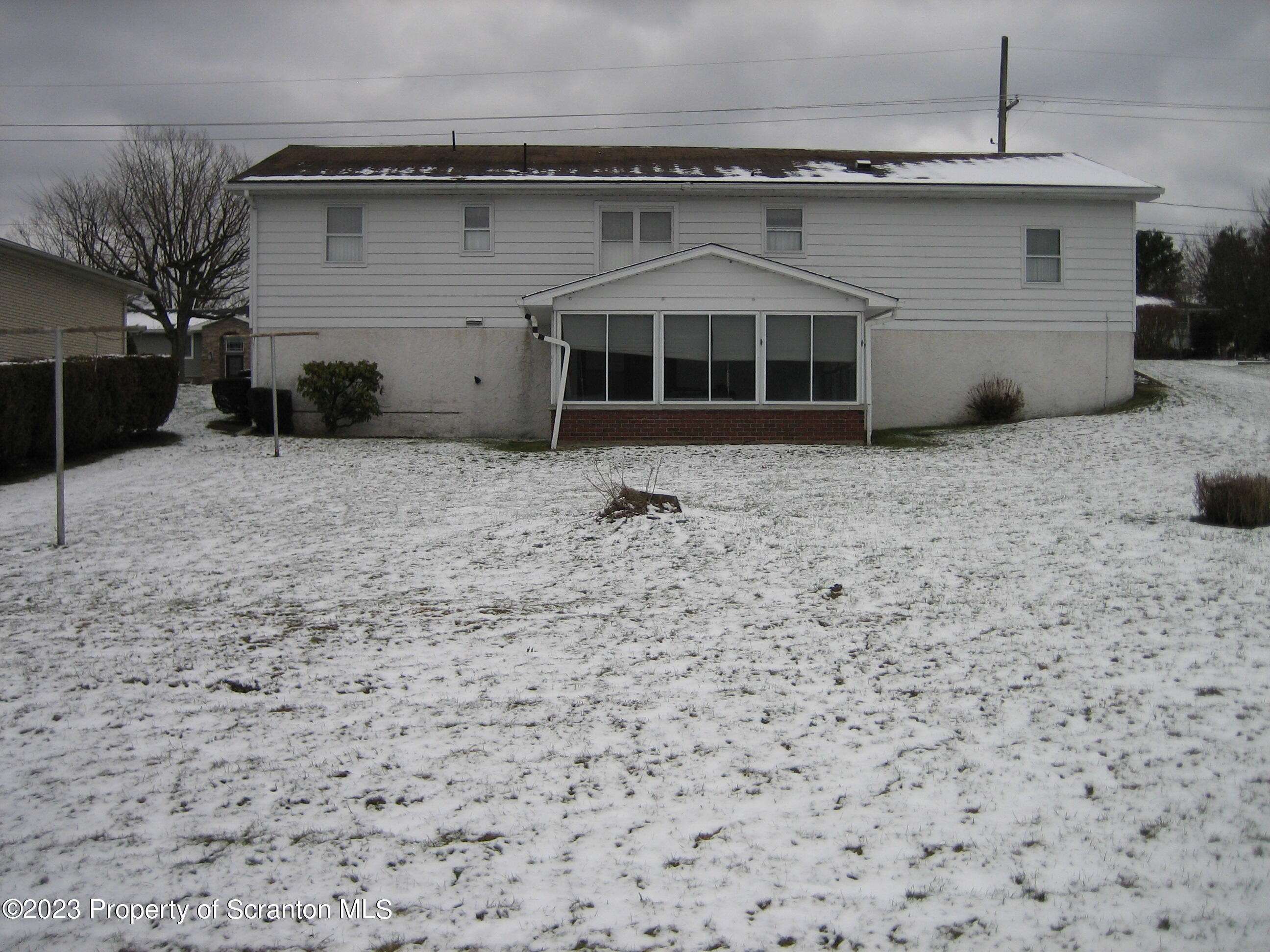 711 3rd Street Eynon, PA 18403 - Photo 29 of 29 a front view of a house with a yard