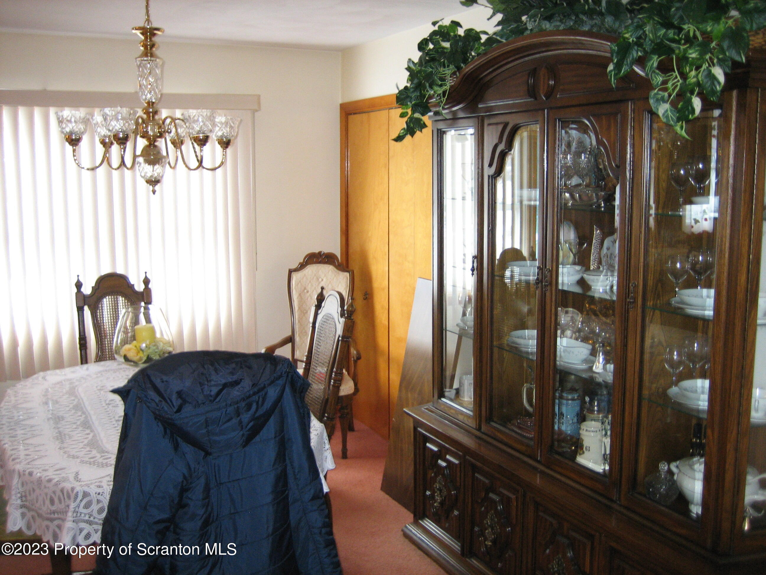 711 3rd Street Eynon, PA 18403 - Photo 4 of 29 a view of a balcony with furniture and chandelier