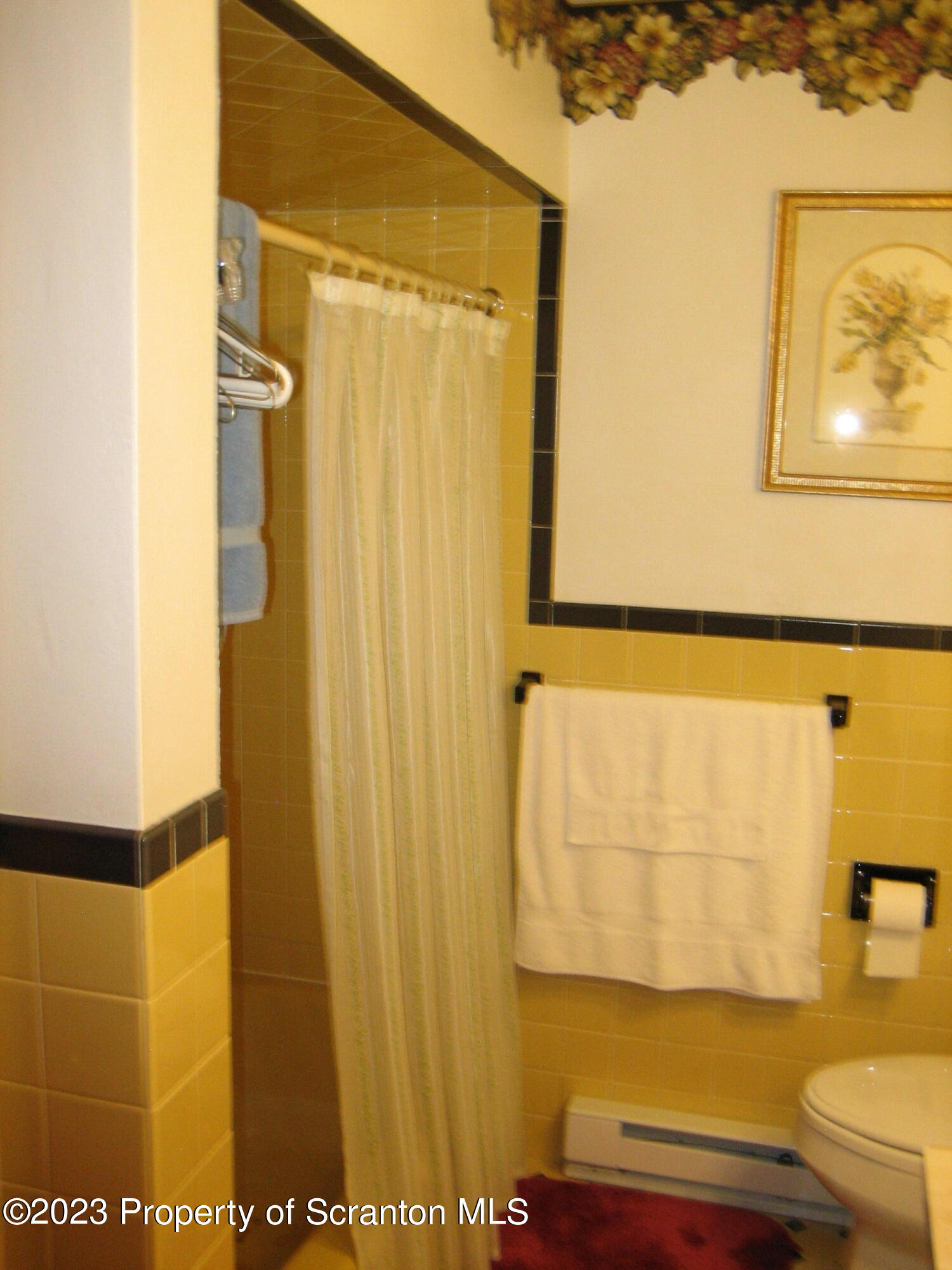 711 3rd Street Eynon, PA 18403 - Photo 9 of 29 a bathroom with a shower and a toilet