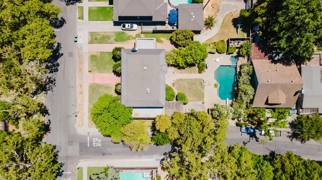 a living room with furniture a rug and a fireplace