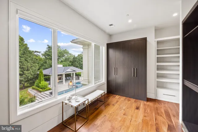 a view of a swimming pool with seating area