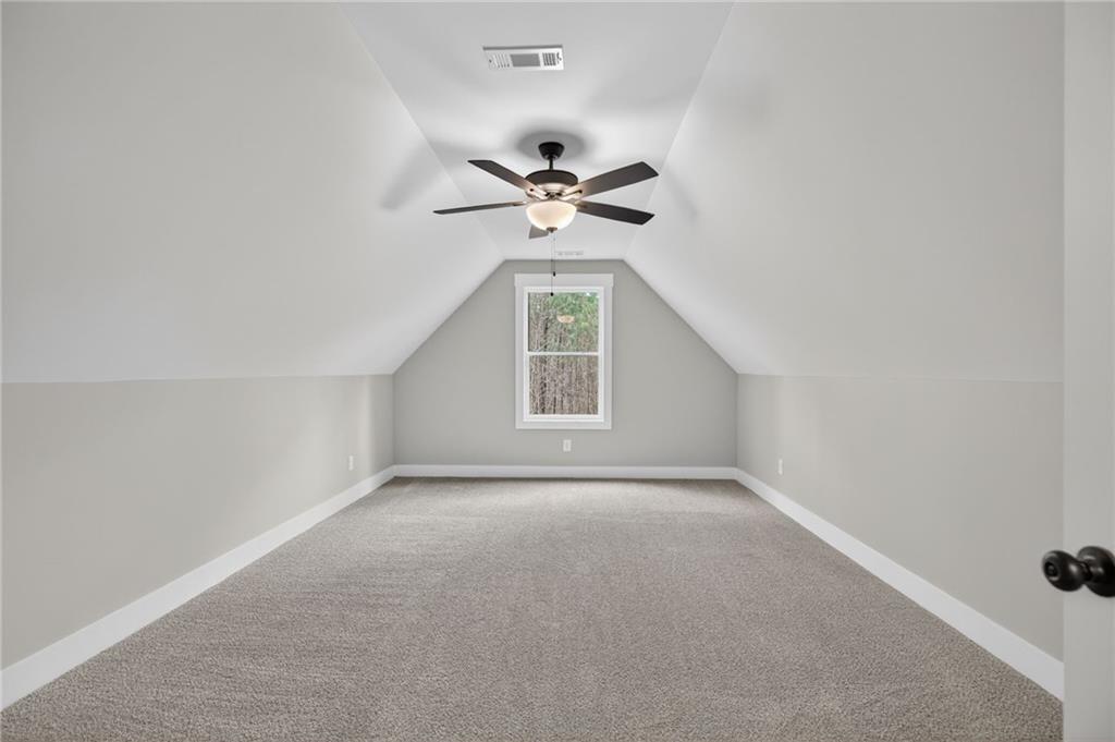 423 Relay Road Silver Creek, GA 30173 - Photo 35 of 48 a view of a ceiling fan with a window