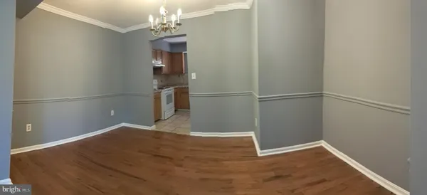 a kitchen with a sink and a stove