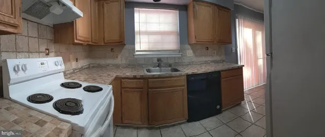 a view of livingroom with hardwood floor and hallway