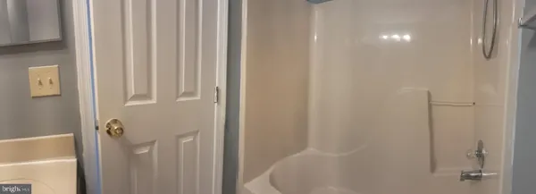 a bathroom with a tub