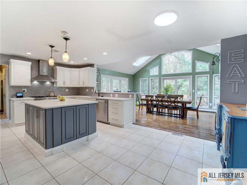 4 Cherokee Road East Brunswick, NJ 08816 - Photo 13 of 40 a kitchen with a cabinets counter top space a sink stainless steel appliances and cabinets