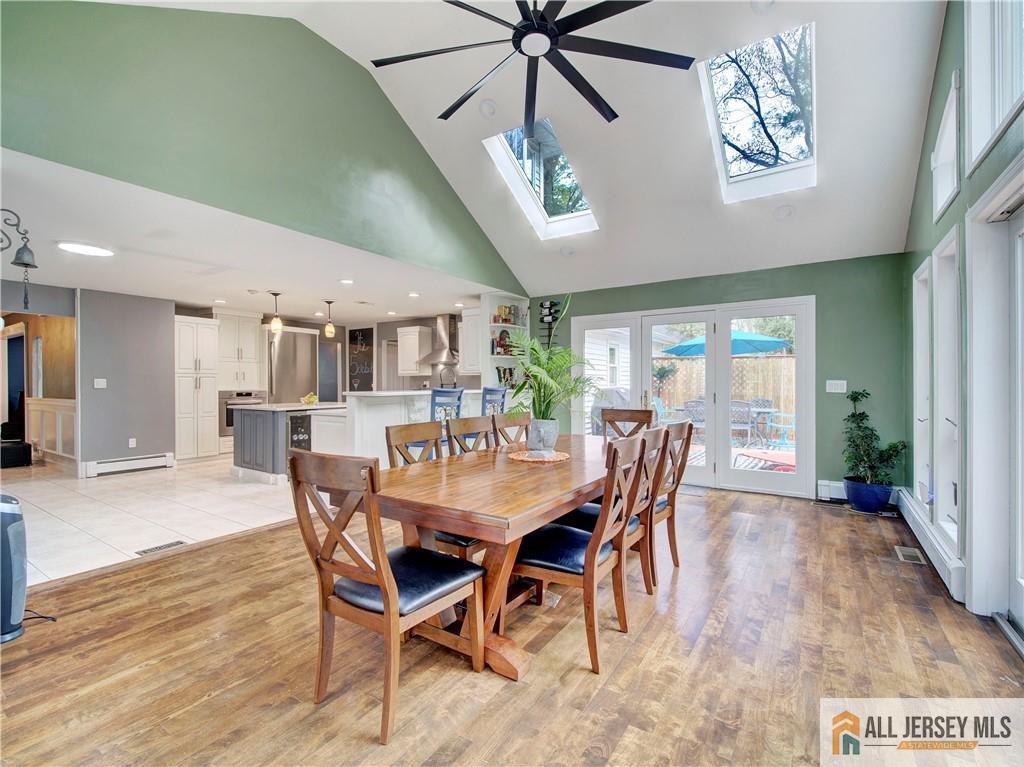 4 Cherokee Road East Brunswick, NJ 08816 - Photo 15 of 40 a dining room with furniture window and wooden floor