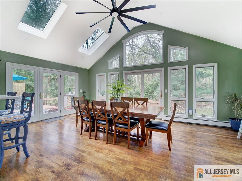4 Cherokee Road East Brunswick, NJ 08816 - Photo 16 of 40 a view of a dining room with furniture window and wooden floor