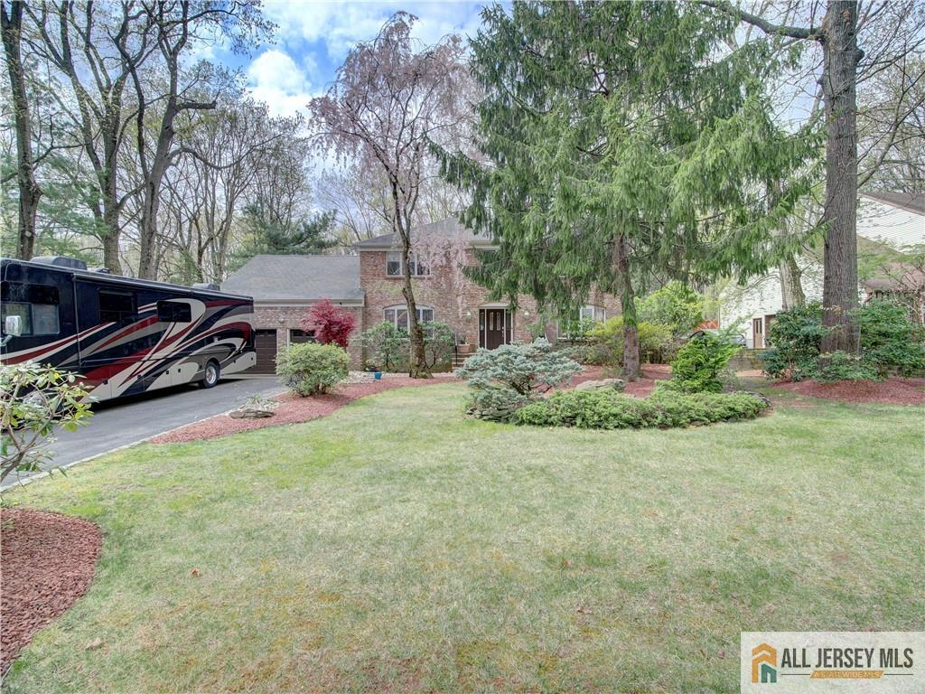 4 Cherokee Road East Brunswick, NJ 08816 - Photo 3 of 40 a view of a park with large trees