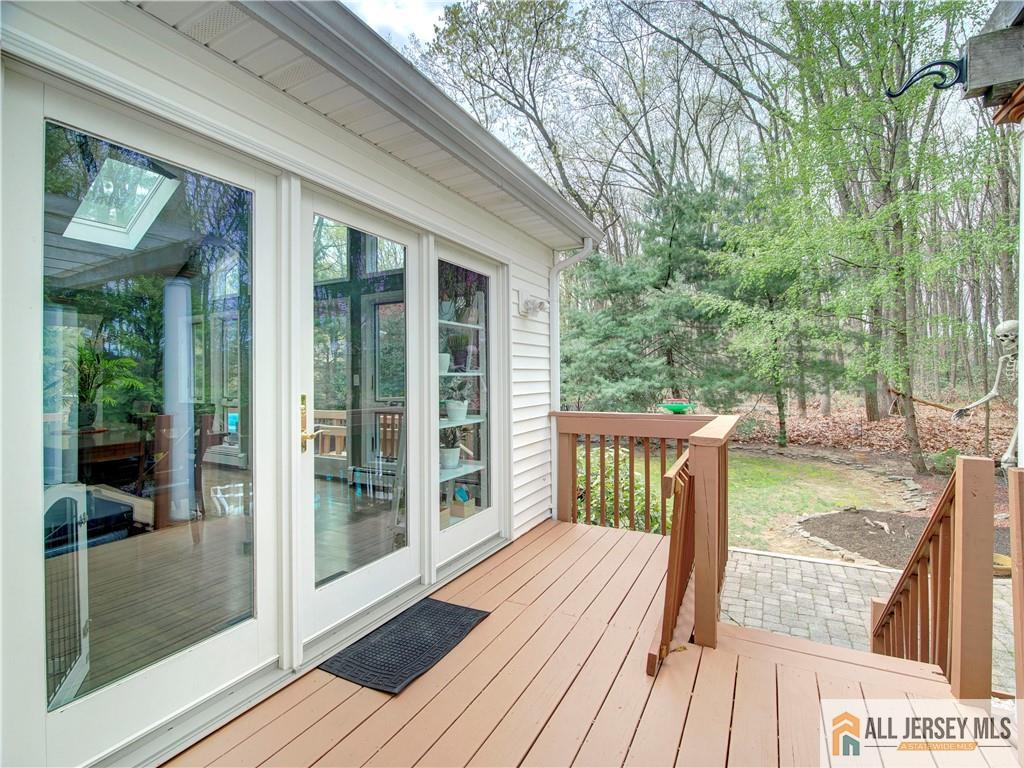 4 Cherokee Road East Brunswick, NJ 08816 - Photo 37 of 40 a view of balcony with deck and wooden floor