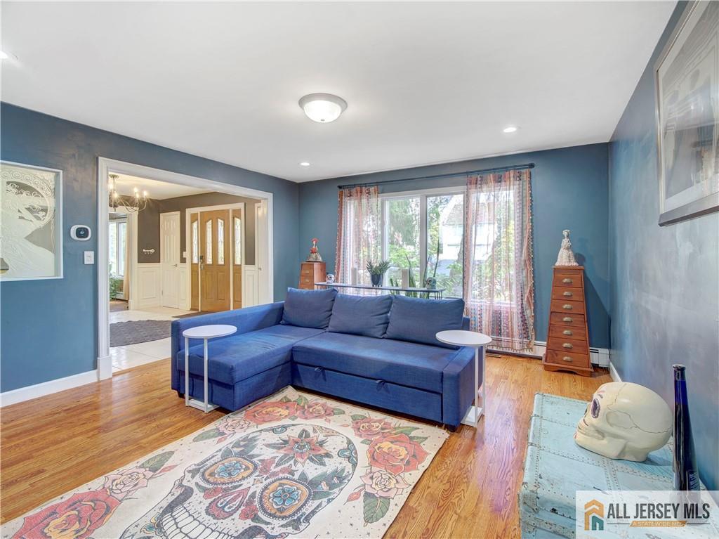 4 Cherokee Road East Brunswick, NJ 08816 - Photo 9 of 40 a living room with furniture and a window