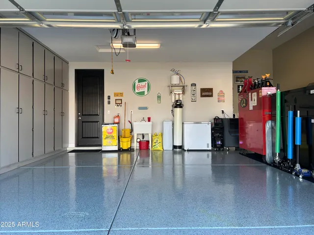 a view of a swimming pool with a lounge chairs