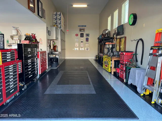 a view of a house with backyard sitting area and porch
