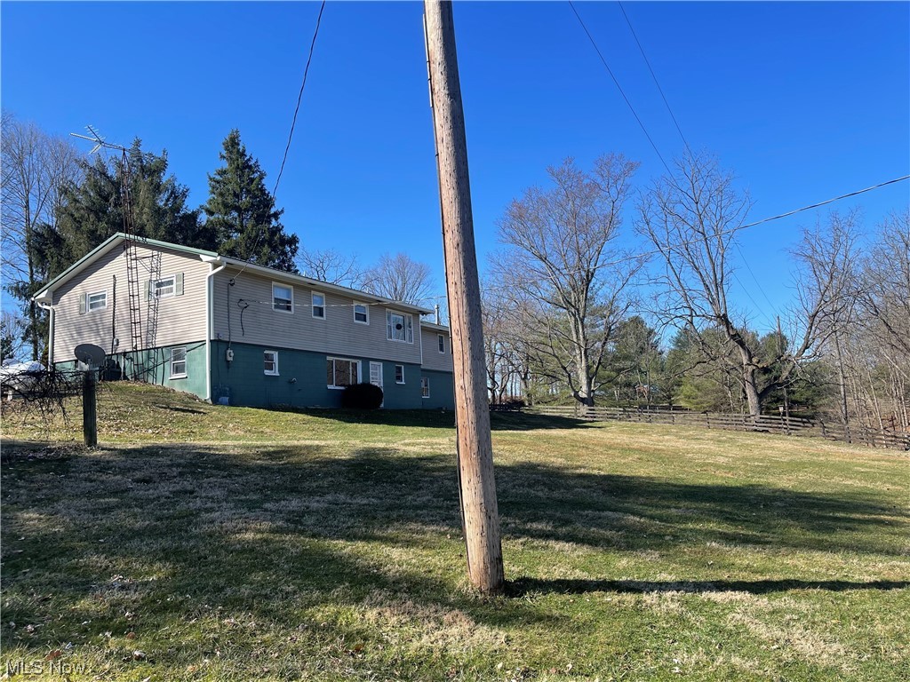 4010 Workman Road Mount Perry, OH 43760 - Photo 5 of 36 View of home's exterior with a lawn