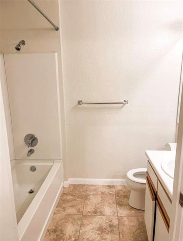 521 Southwest Parkway, Unit 103 College Station, TX 77840 - Photo 5 of 6 a bathroom with a sink a toilet and shower
