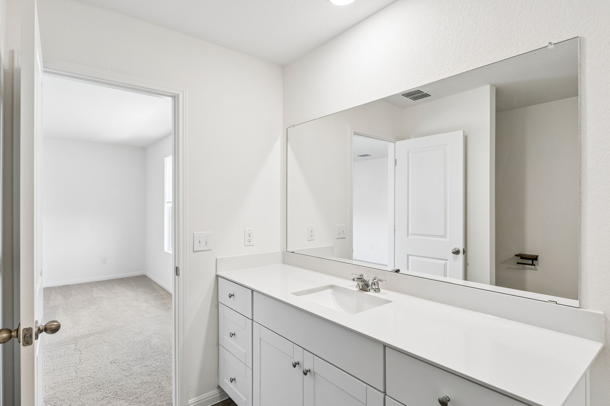 550 Thistle Lane Maxwell, TX 78656 - Photo 19 of 29 a bathroom with a sink and a mirror
