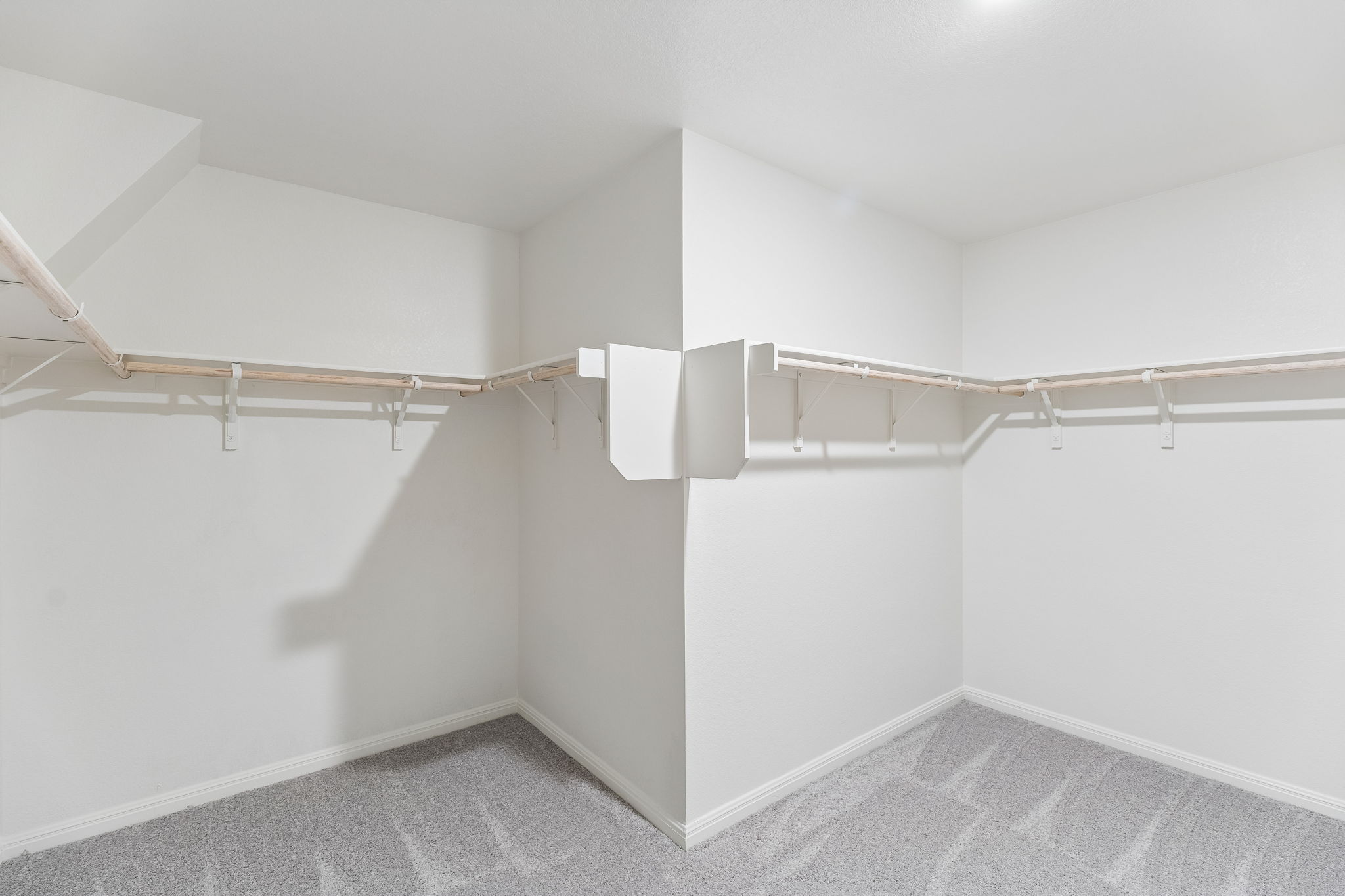 550 Thistle Lane Maxwell, TX 78656 - Photo 20 of 29 a view of walk in closet with empty racks