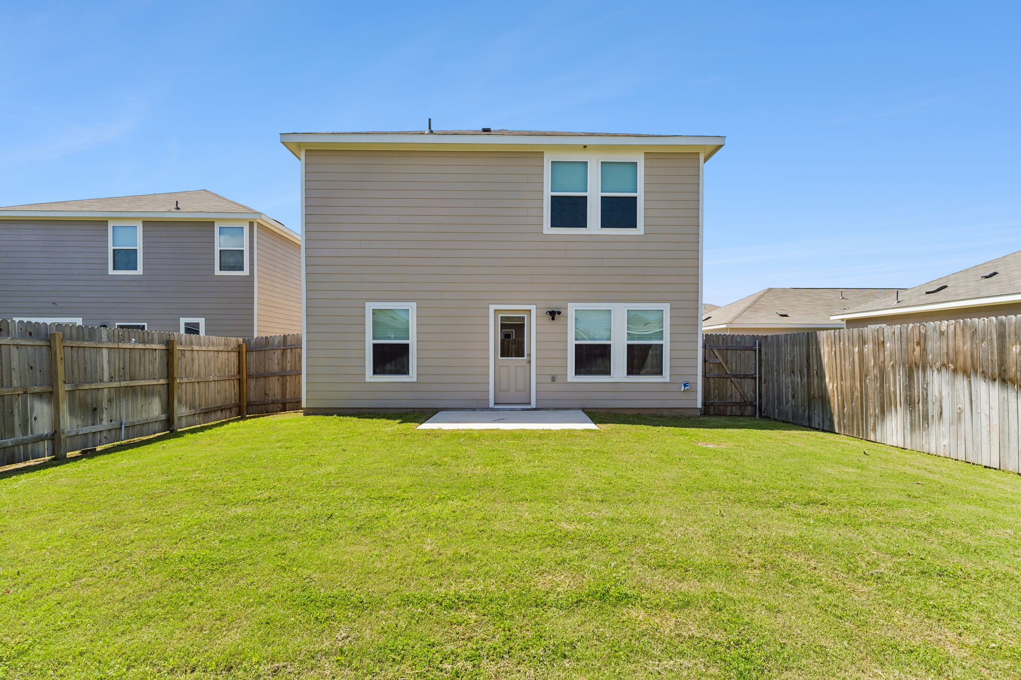 550 Thistle Lane Maxwell, TX 78656 - Photo 27 of 29 a backyard of a house with lots of green space