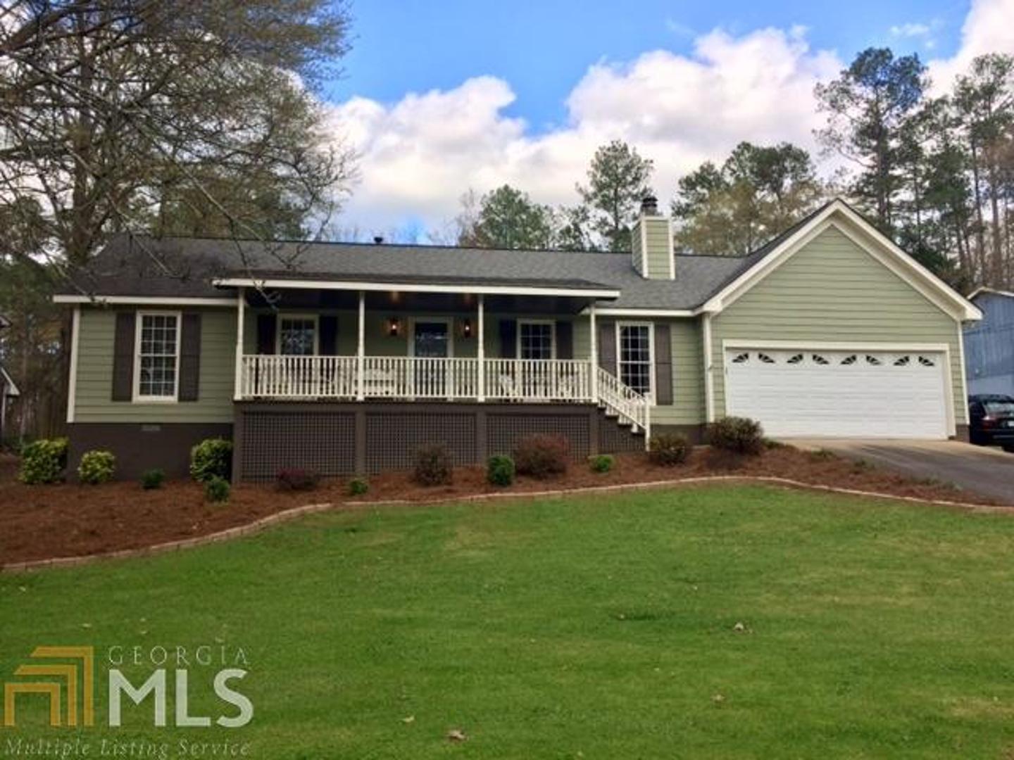 27 Ford Road Southeast, Unit 148 Rome, GA 30161 - Photo 1 of 1 a view of a house with a yard and sitting area