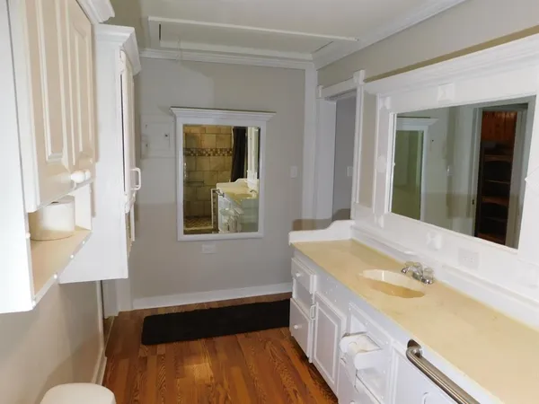 a bathroom with a sink and a bathtub