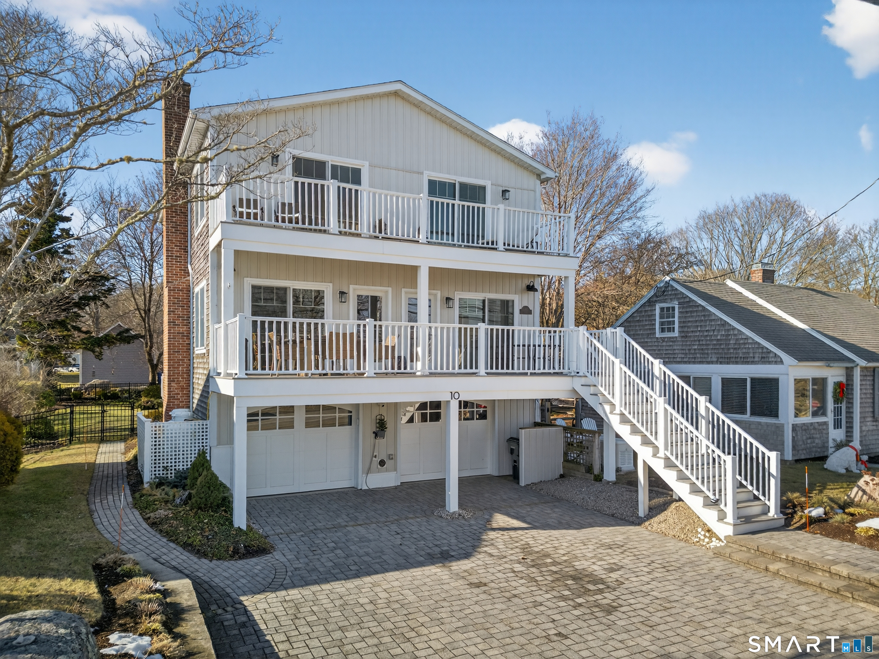 10 East Shore Avenue Groton, CT 06340 - Photo 1 of 1 a view of a house with backyard and sitting area