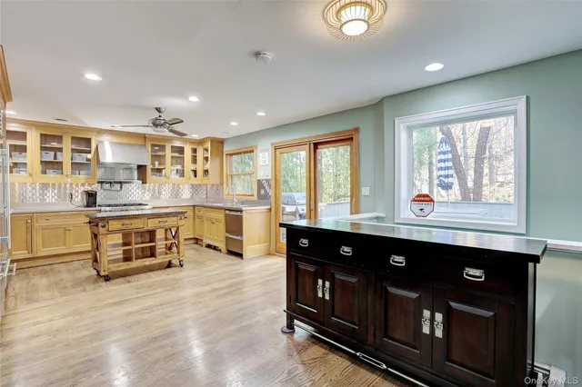 a kitchen with a stove and a refrigerator